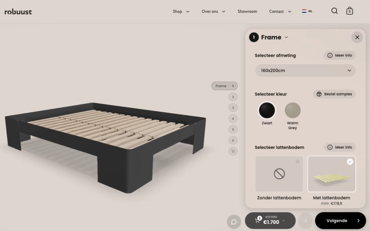 Robuust’s configurator: a black steel bed frame is built up step by step, with slats, headboard, mattress, nightstand, drawer, and lighting, as the price in the side panel updates